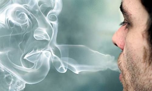 Man-blowing-smoke1